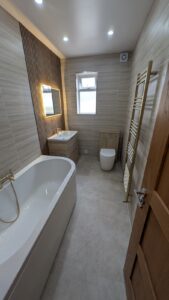 Brushed Brass & Oak Slatwall Bathroom